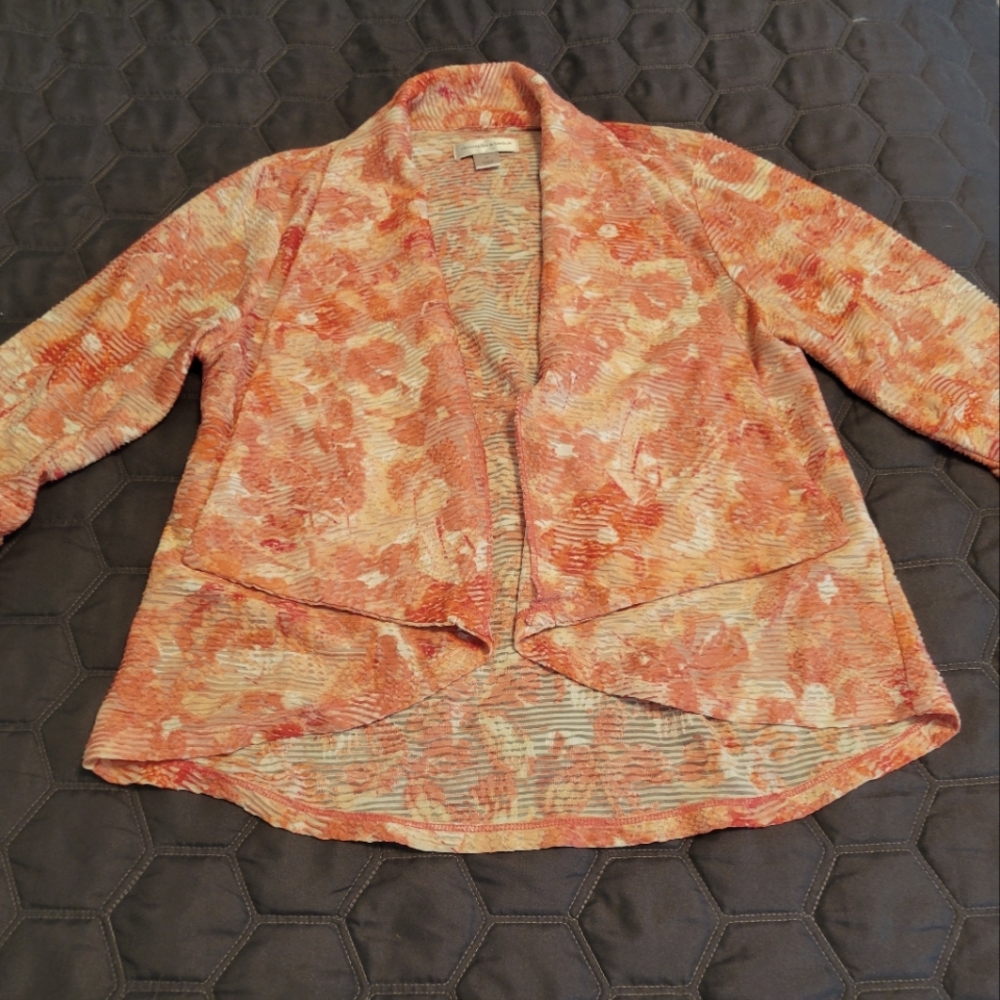 Orange/peach floral wrap. Size medium